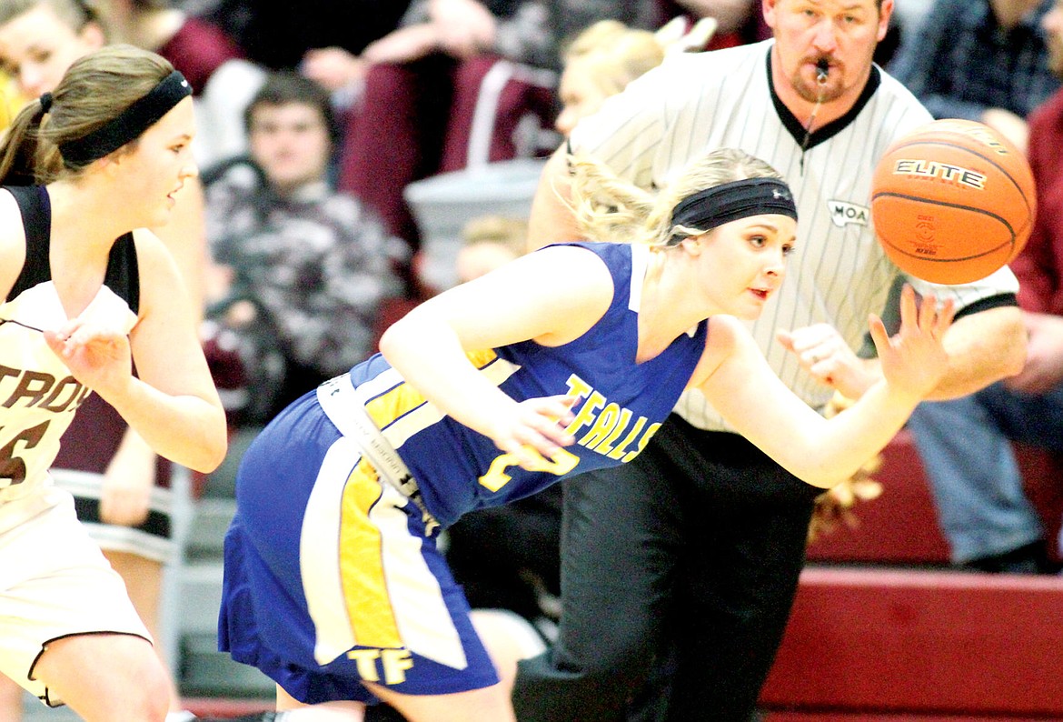 &lt;p&gt;Lindsay Laws steals the ball from Kaitlyn Downey in first quarter vs. Troy, Jan. 2.&lt;/p&gt;