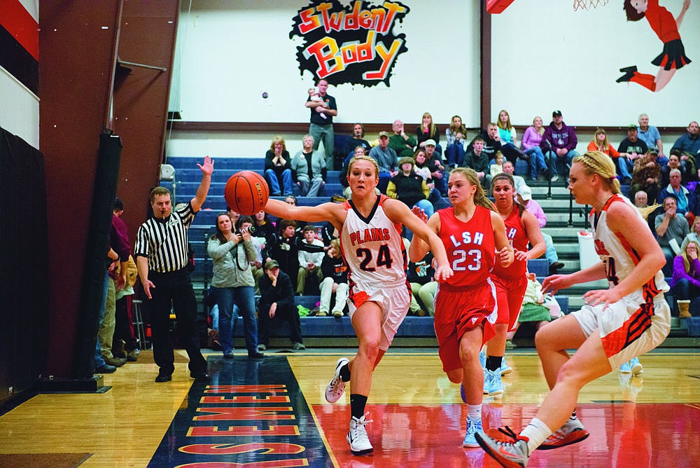 &lt;p&gt;Hailey Phillips, drives the lane against the Loyola Sacred Heart Breakers during the Friday night game.&lt;/p&gt;