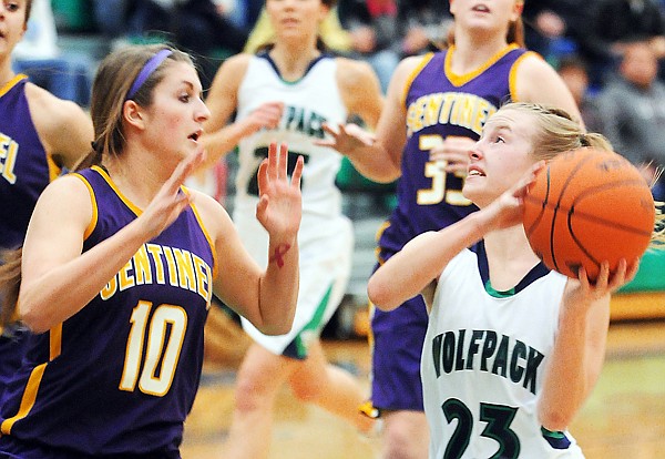 &lt;p&gt;Glacier senior guard Amy Lybeck (23) eyes the basket while
Missoula Sentinel senior&lt;/p&gt;&lt;p&gt;Kennedy Fulbright (10) applies defensive pressure.&lt;/p&gt;&lt;p&gt;&lt;/p&gt;