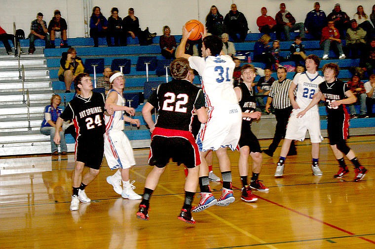 &lt;p&gt;Senior Jarrod Tippens jumps to take a shot at the Bobcat's home game against Hot Springs Friday, January 3.&lt;/p&gt;