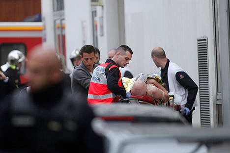 &lt;p&gt;An injured person is treated by nursing staff outside the French satrical newspaper Charlie Helbdo's office, In Paris, on Wednesday.&lt;/p&gt;