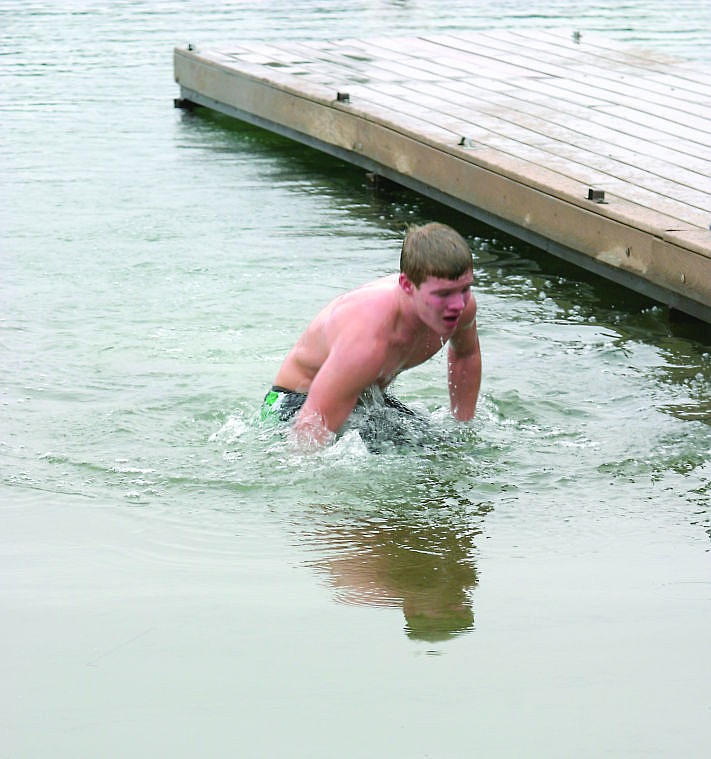 &lt;p&gt;Denton Long heads for shore after his second go at the 15th annual New Year's Day Polar Plunge.&lt;/p&gt;