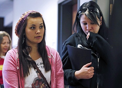 &lt;p&gt;Chantel Blunk, left, leaves with a family member following a preliminary hearing for James Holmes at the courthouse in Centennial, Colo., on Monday. Investigators say Holmes opened fire during the midnight showing of the latest Batman movie on July 20, killing 12 people and wounding dozens. Blunk's husband Jon was killed in the shooting.&lt;/p&gt;