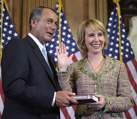 &lt;p&gt;In this Jan. 5, 2011 file photo, House Speaker John Boehner reenacts the swearing in of Rep. Gabrielle Giffords, D-Ariz., on Capitol Hill in Washington.&lt;/p&gt;