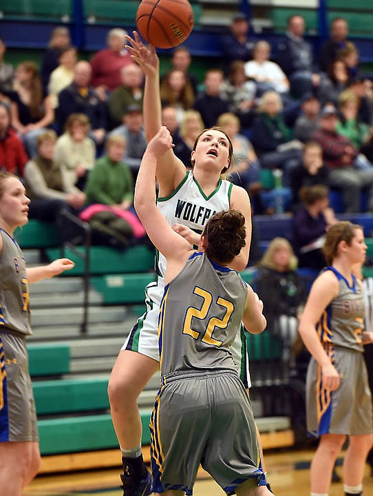 <p>Glacier senior Taylor Salonen, 3, shoots over a defender in Saturday's game against Missoula Big Sky. (Brenda Ahearn/Daily Inter Lake)</p>
