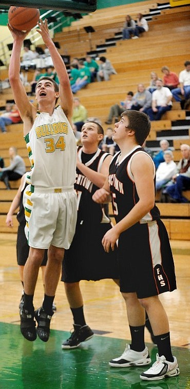 Whitefish senior Connon Silliker (34) shoots for two under during the game against Frenchtown on Saturday.