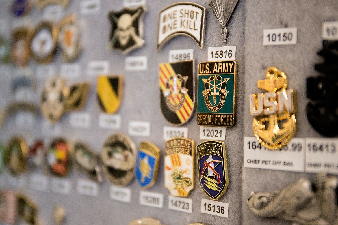 &lt;p&gt;A United States Army Special Forces pin is displayed among thousands of other military-related pins at the new pin cabinet at the American Legion Post 143 in Post Falls.&lt;/p&gt;