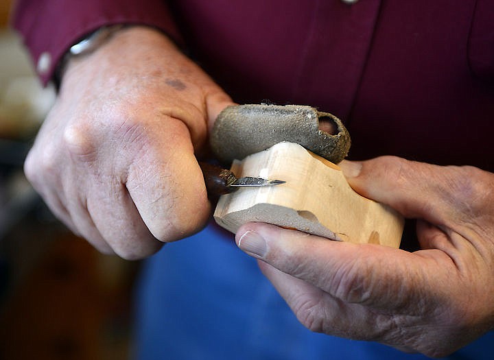 &lt;p&gt;Clyde Pederson shaves a block of wood against the grain to test its sharpness at his home on Thursday, December 11, in Kalispell. (Brenda Ahearn/Daily Inter Lake)&lt;/p&gt;