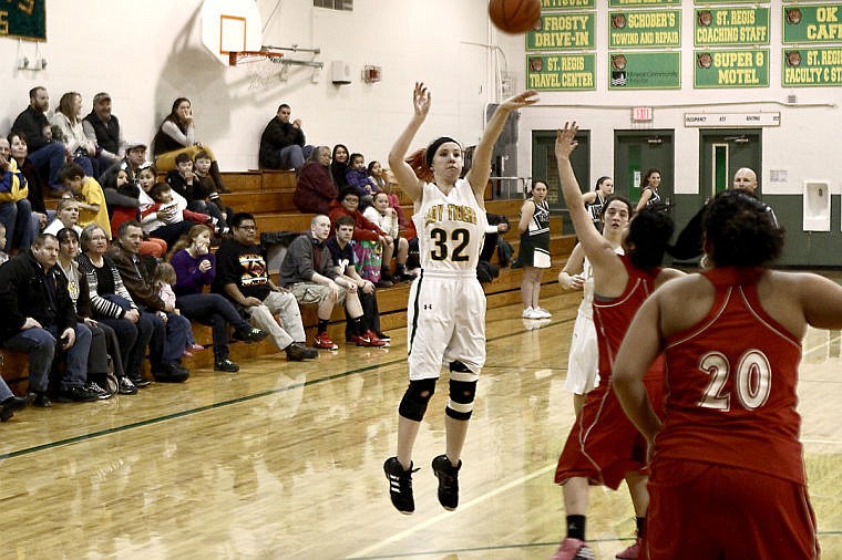 &lt;p&gt;St. Regis freshman Pilar Cantrell-Field scores two of her 25-points against Two Eagle River on Friday.&lt;/p&gt;