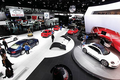 &lt;p&gt;The Volkswagen exhibit shows the 2013 line of automobiles at the North American International Auto Show in Detroit, Monday, Jan. 9, 2012. (AP Photo/Paul Sancya)&lt;/p&gt;