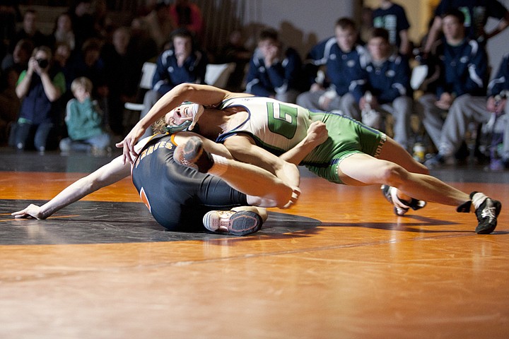 &lt;p&gt;Glacier's Christian Knopp (right) gets a reversal on Flathead's
Tyler Davis during Tuesday night's Crosstown wrestling dual at
Flathead High School.&lt;/p&gt;