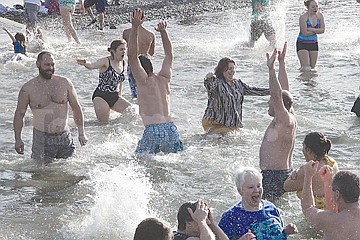 &lt;p&gt;New Year's revelers charge boldly into the bone-chilling waters of the Flathead River at the 16th annual Polar Plunge held in Polson on Jan. 1.&lt;/p&gt;