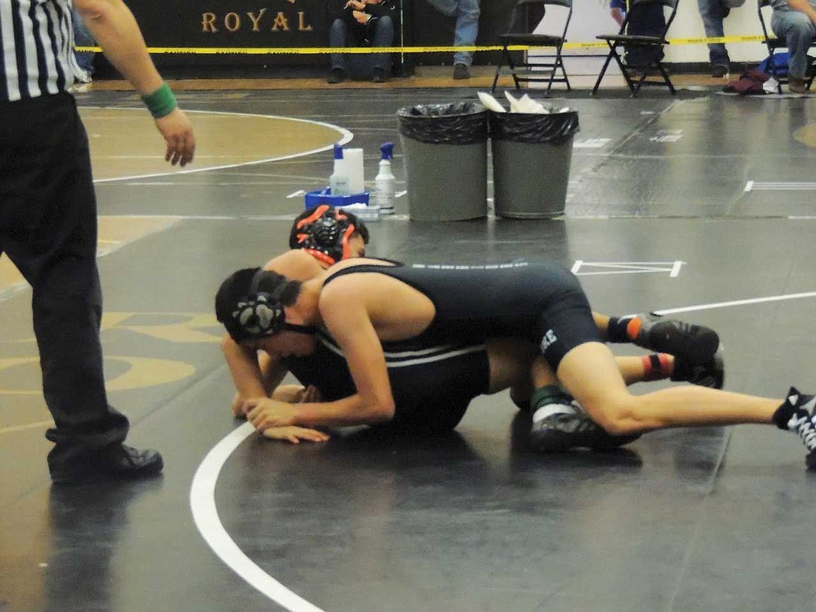 Christopher Lara of Wahluke controls an Ephrata opponent on his way to a 10-1 victory at 126 pounds at the Christmas Wrestling Tournament.