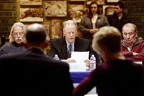 &lt;p&gt;Coeur d'Alene city councilmen Woody McEvers, left, and Ron Edinger listen as Mike Gridley reads a letter Thursday regarding the history of Person Field ownership at a negotiation meeting between the Coeur d&#146;Alene City council and Coeur d'Alene school board trustees.&lt;/p&gt;