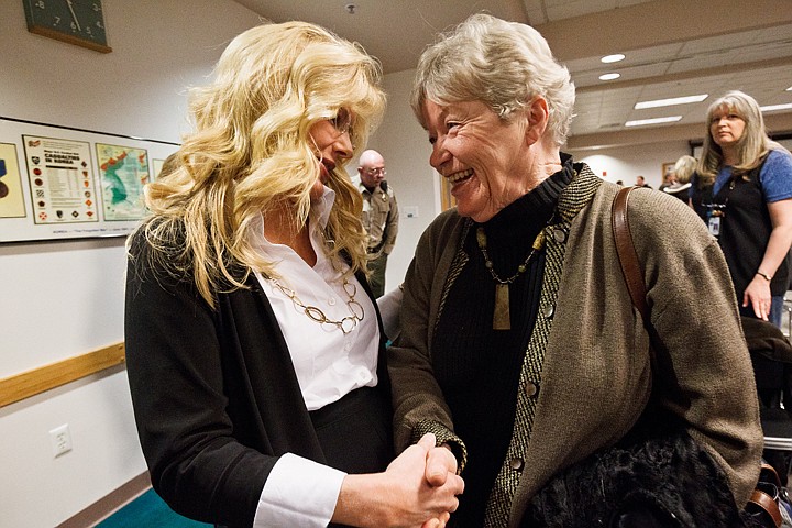 &lt;p&gt;Jai Nelson is congratulated by Evelyn Adams, who served as a commissioner 25 years ago, following a ceremony Monday where elected county officials were sworn in at the Kootenai County Administration Building in Coeur d'Alene.&lt;/p&gt;