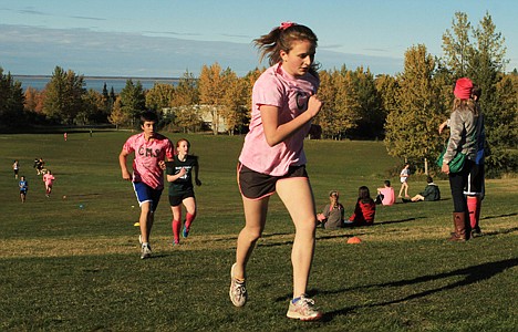 &lt;p&gt;Central and Mirror Lake Middle School cross-country runners, wearing pink for breast cancer awareness, climb the final hill of a cross-country race at Kincaid Park in Anchorage, Alaska on Tuesday, Oct. 1, 2013.&lt;/p&gt;