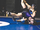 Warden wrestlers win two