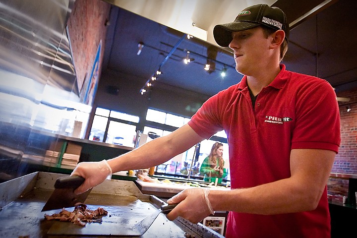 &lt;p&gt;Joshua Sattler prepares a customer's order on the grill Feb. 19, 2010 at the Pita Pit in Coeur d'Alene.&lt;/p&gt;