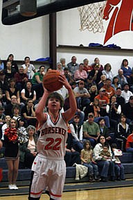 Senior guard Jeff Revier scored two of his 14 points in a loss against the Lions on this lay-up.