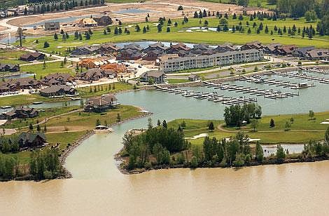 The Flathead River flows past the Harbor Village area in this fall 2006 aerial photo. Remapping of Flathead County by the Federal Emergency Management Agency now places more homeowners within the 100-year flood plain. Owners with mortgages are being surprised with notices from their banks requiring them to purchase flood insurance. Karen Nichols file photos/Daily Inter Lake