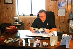 Pastor Al Johnson, who arrived at Superior Assembly, not even a month ago, takes time to prepare for the evening service, which is a study of Joyce Meyer's book, &quot;Knowing God Intimately.&quot;