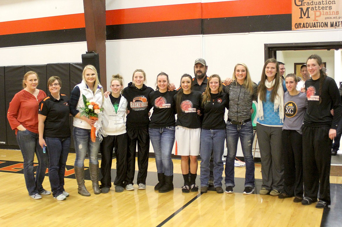 &lt;p&gt;The members of the Plains track team for the last three years gather to celebrate their third state championship in a row during a Plains basketball game. The celebration also included the unveiling of the new 2015 state championship banner.&lt;/p&gt;