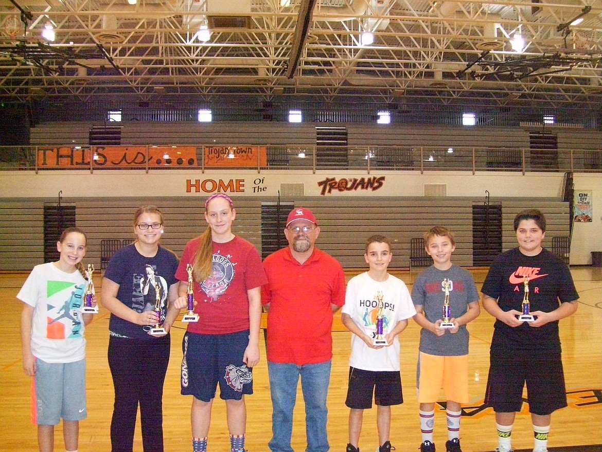 &lt;p&gt;Courtesy photo&lt;/p&gt;&lt;p&gt;Top finishers in the 12-13 age division at Sunday's local Elks Hoop Shoot at Post Falls High School: From left, girls third-place finisher Kendall Pickford, second place Madison Wiedenhoff, first place Brooke Jessen, Hoop Shoot Director Rick Alexander Jr., boys first place Josiah Heath, second place Taylor Menti, third place Wyatt Dickinson.&lt;/p&gt;