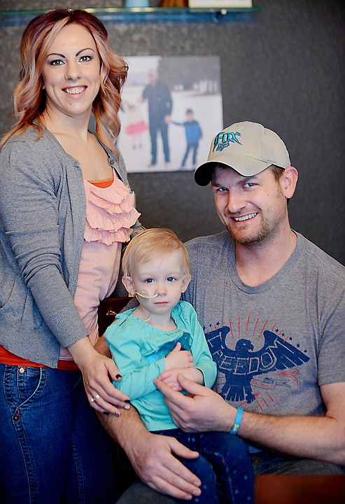 <p>Nicole and David Marr with their two-year-old daughter Jade on Friday, January 10, at their home in Kalispell. (Brenda Ahearn/Daily Inter Lake)</p>