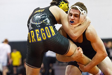 &lt;p&gt;Post Falls High's Tyler Mahal shoots a single leg on Zach Studer, of Hermiston, in the 145-pound finals match.&lt;/p&gt;