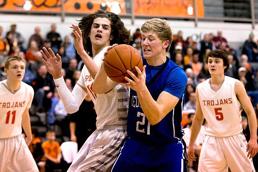 &lt;p&gt;The Coeur d'Alene Vikings battle with the Post Falls Trojans on Tuesday, Jan. 12, 2016 at Post Falls High School. The Trojans emerged victorious by one point, in a nail-biting 50-49 finish.&#160;&lt;/p&gt;