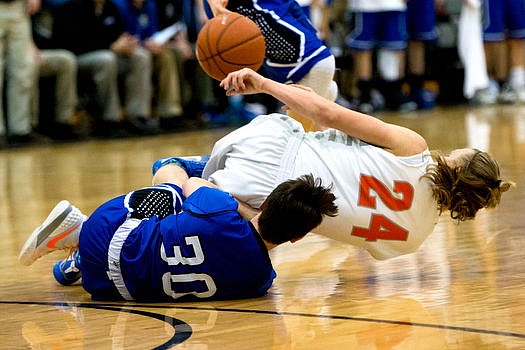 &lt;p&gt;The Coeur d'Alene Vikings battle with the Post Falls Trojans on Tuesday, Jan. 12, 2016 at Post Falls High School. The Trojans emerged victorious by one point, in a nail-biting 50-49 finish.&#160;&lt;/p&gt;