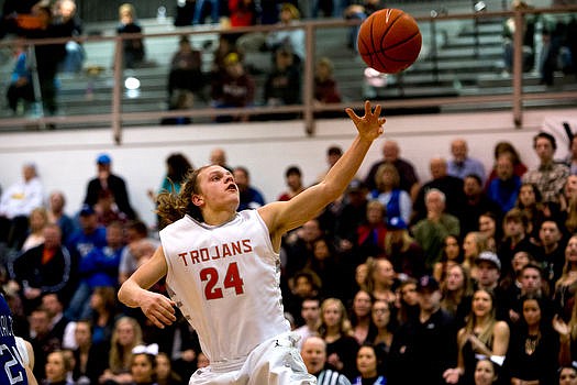 &lt;p&gt;Post Falls' Zach Hillman soars to score two points on a lay-up during the second half of a match-up against Coeur d'Alene on Tuesday at Post Falls High School.&lt;/p&gt;