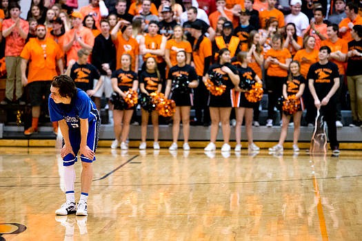 &lt;p&gt;With the Post Falls student section behind him, Coeur d'Alene's Brody Lundblad looks towards his team's bench as the final seconds tick off the clock, marking Coeur d'Alene's second loss of the season on Tuesday at Post Falls High School.&lt;/p&gt;