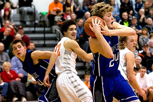 &lt;p&gt;The Coeur d'Alene Vikings battle with the Post Falls Trojans on Tuesday, Jan. 12, 2016 at Post Falls High School. The Trojans emerged victorious by one point, in a nail-biting 50-49 finish.&#160;&lt;/p&gt;