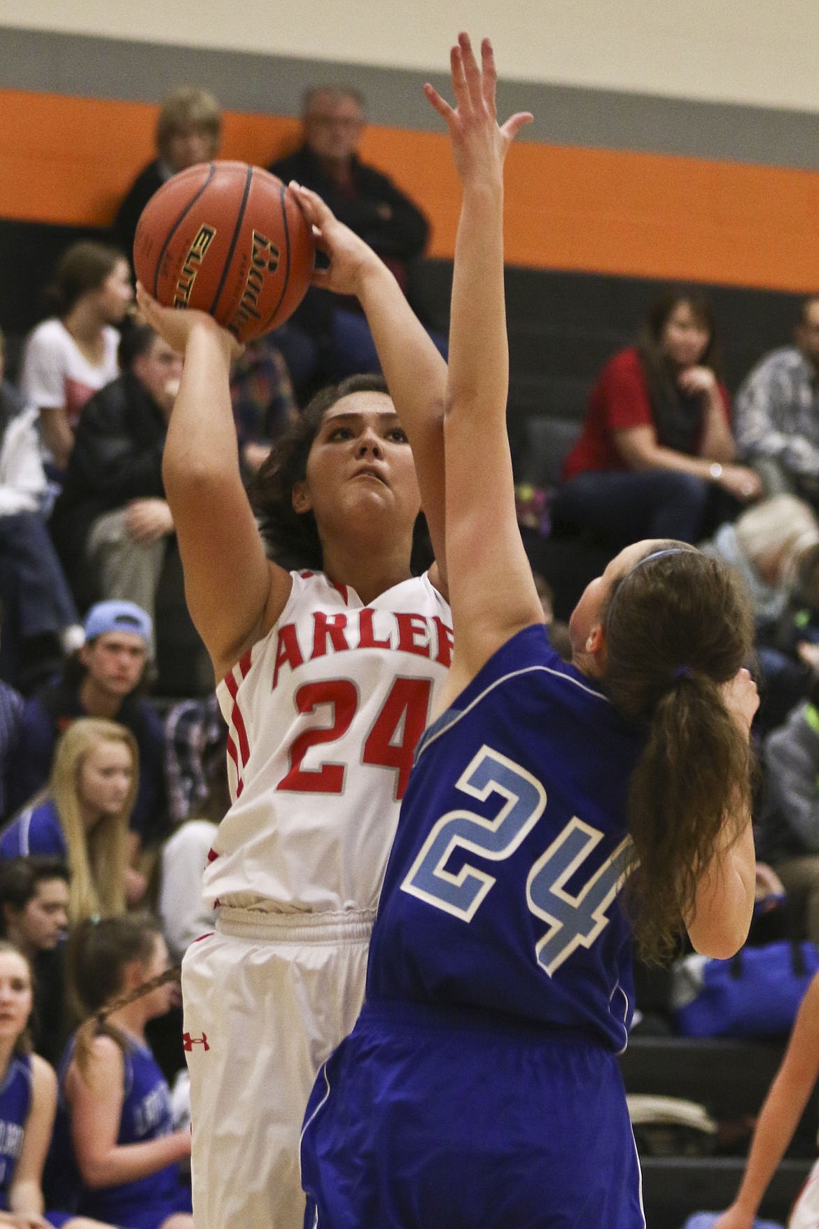 &lt;p&gt;Alyssia Vanderburg shoots over a Drummond defender during Arlee's game on Friday in Frenchtown.&lt;/p&gt;