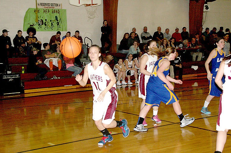 &lt;p&gt;Junior Taylor Erdman chases down a long pass at Friday's Lady Panthers basketball game against the Victor Lady Pirates.&lt;/p&gt;