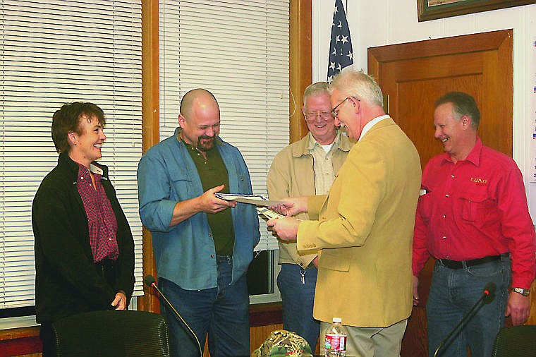 &lt;p&gt;Mayor Greg Eitelberg presents the four council members with their reelection certificates. Audrey Kolbeck, Dan Rowan, Carl Reeb and Chris Allen were all reelected.&lt;/p&gt;