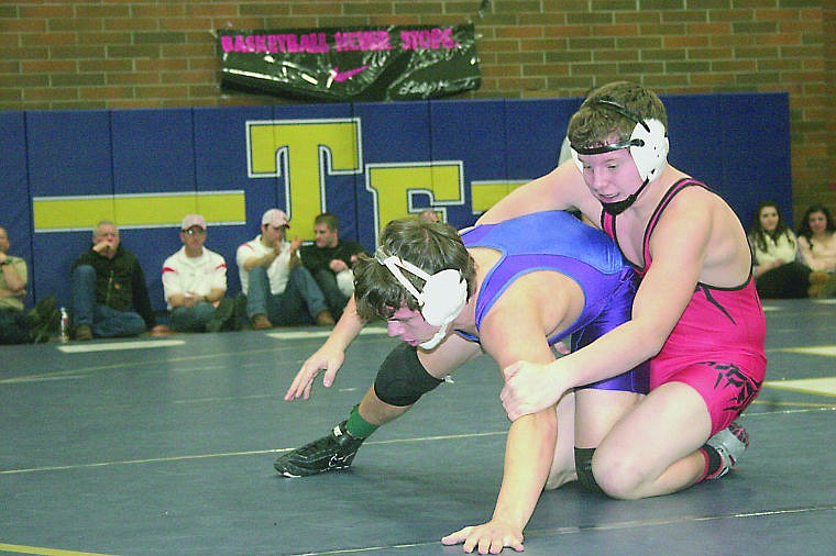 &lt;p&gt;Noxon wrestler Luke Crowe takes on his opponent during the Saturday tournament in Thompson Falls. Crowe came in second place in his class.&lt;/p&gt;