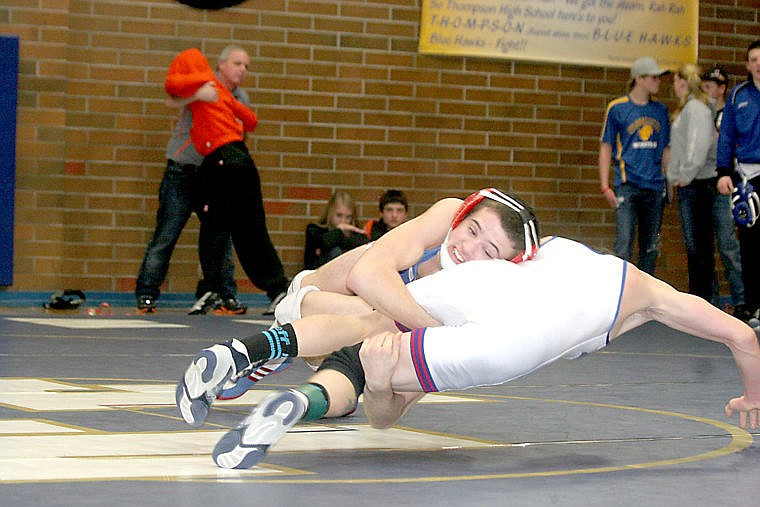 <p>Superior wrestler Anthony Parkin slams Morgan Schultz of Arlee to the mat during one of his matches at Saturday's Ted Kato Tournament.</p>