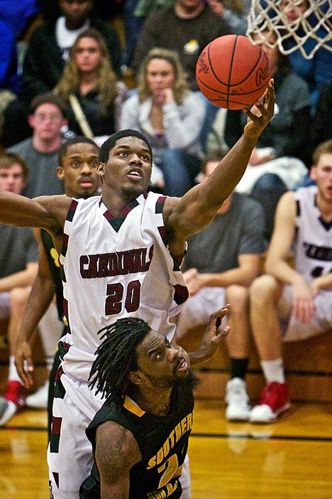 &lt;p&gt;North Idaho College's Edrico McGregor elevates over the top of Rafriel Guthrie from the College of Southern Idaho as he grabs a rebound in the second half of the Cardinals 75-71 win over Golden Eagles.&lt;/p&gt;