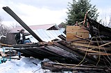 Heavy, wet snow causes three barns to collapse