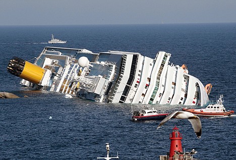 &lt;p&gt;The luxury cruise ship Costa Concordia lays on its side after running aground the tiny Tuscan island of Giglio, Italy, Saturday. A luxury cruise ship ran aground off the coast of Tuscany, sending water pouring in through a 160-foot gash in the hull and forcing the evacuation of some 4,200 people from the listing vessel early Saturday.&lt;/p&gt;