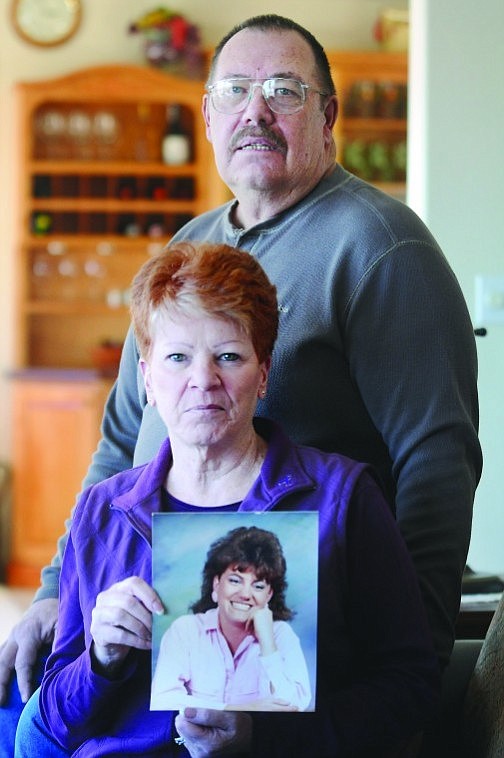 &lt;p&gt;Jay and Roxanne Wadman hold a photo of their daughter, Alicia
&quot;Lisa&quot; Sherman, at their home in Lakeside. Sherman was taken off
life support on Dec. 19 in Salt Lake City, Utah, following a savage
beating. Sherman's boyfriend of eight years, Dan Folsom, has been
charged with her murder.&lt;/p&gt;