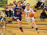 Lady Dogs show spirit against rival Kats