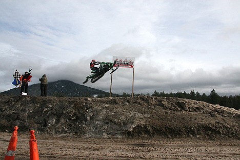 &lt;p&gt;Chris Duthie of Elleford, British Columbia, jumps his snowmobile over the finish line on Saturday at the Kootenai County Fairgrounds.&lt;/p&gt;