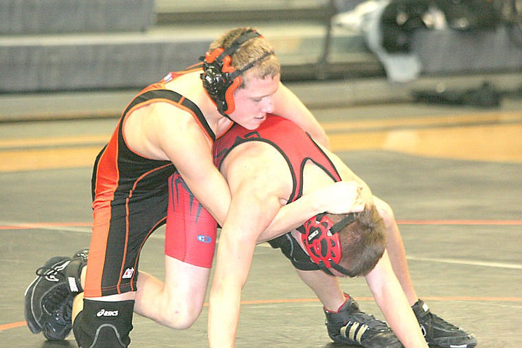 &lt;p&gt;Dusten Henning takes down a Noxon kiddo at the Plains Quad tourney on Thursday.&lt;/p&gt;