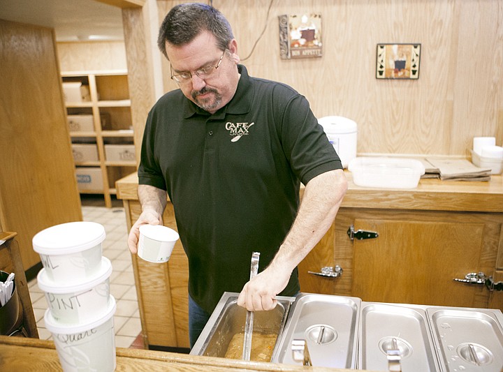 &lt;p&gt;Steve Murray, owner of Cafe Max Soup Co., scoops out a bowl of
Thai chicken soup at the new restaurant in Whitefish on Wednesday
evening.&lt;/p&gt;