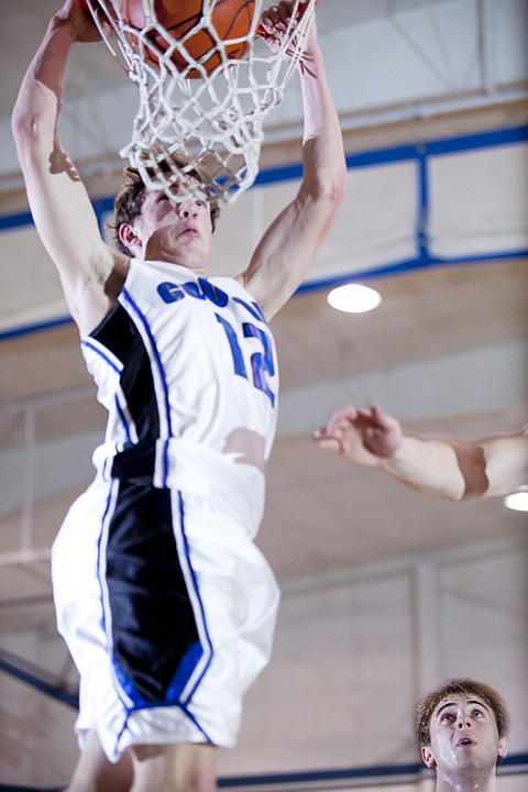 &lt;p&gt;Stillwater Christian's Josh Bray (12) throws down a dunk during
the second quarter of the Cougars' home game against Eureka Tuesday
night.&lt;/p&gt;