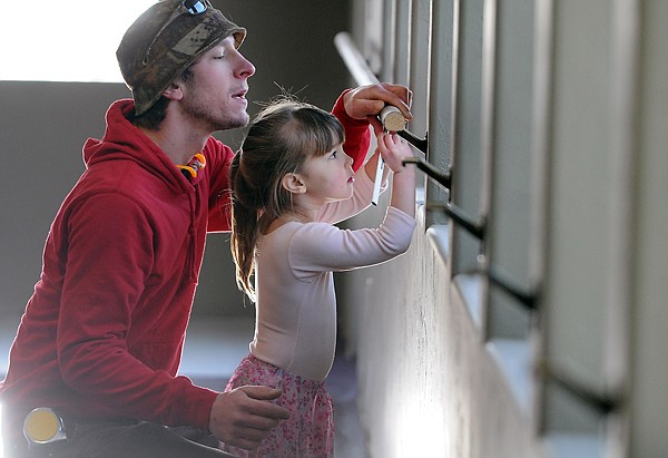 &lt;p&gt;Neil Molter watches as his 3-year-old daughter CeCe helps him
make measurements for new ballet studio barres at Noble Dance Jan.
9 in Kalispell.&lt;/p&gt;