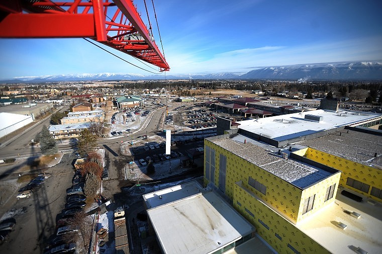 &lt;p&gt;The Swank Enterprises tower crane lowers insulation Thursday
afternoon for the surgical services addition to Kalispell Regional
Medical Center. Project supervisor Jeff Halsey said that, weather
permitting, crews will have a roof on the building and most of the
framing done by mid-February. Halsey said the mild winter has made
for excellent conditions for construction so far.&lt;/p&gt;